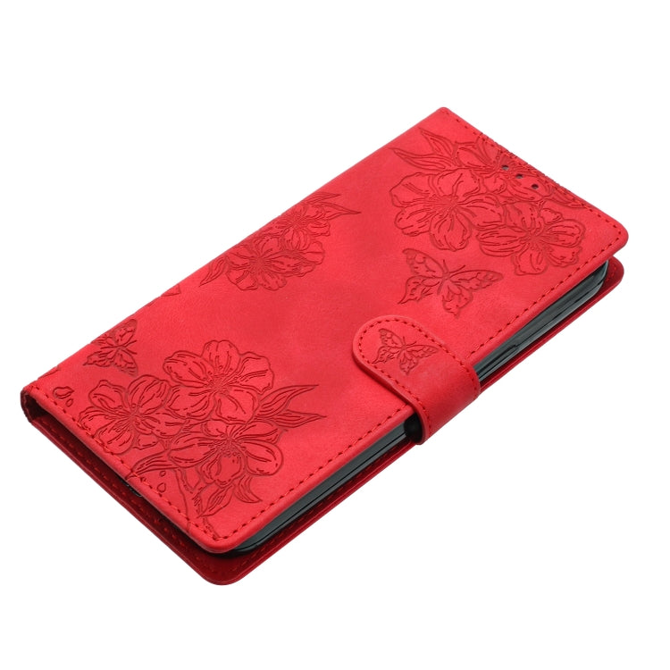 For iPhone 16 Plus Cherry Blossom Butterfly Skin Feel Embossed PU Phone Case(Red) - iPhone 16 Plus Cases by PMC Jewellery | Online Shopping South Africa | PMC Jewellery | Buy Now Pay Later Mobicred